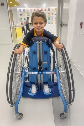 <p>Courtesy Keely Roberts</p> Cooper Roberts in his standing wheelchair