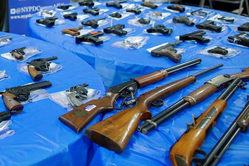 FILE PHOTO: Guns are displayed after a gun buyback event organized by the NYPD, in the Queens borough of New York City