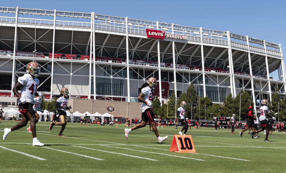 San Francisco 49ers cornerback Richard Sherman (25), center, works out during NFL football training camp practice Saturday, Aug. 15, 2020, at the SAP Performance Facility in Santa Clara, Calif. (Xavier Mascarenas/The Sacramento Bee via AP, Pool)