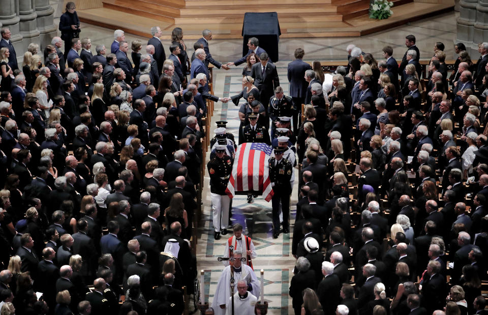 The family of Sen. John McCain, R-Ariz., follows as his casket is carried at the end of a memorial service at Washington National Cathedral in Washington, Saturday, Sept. 1, 2018. McCain died Aug. 25, from brain cancer at age 81. (AP Photo/Pablo Martinez Monsivais)