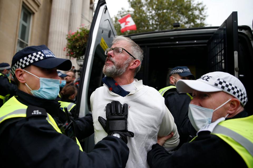 Police arrest a protester (Getty Images)