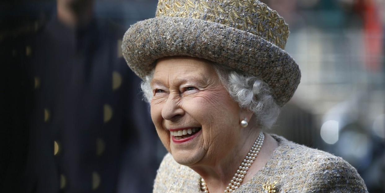 queen elizabeth ii smiling at event