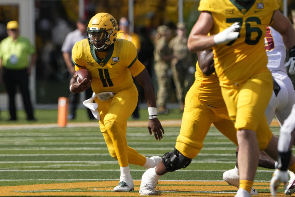 Baylor quarterback Gerry Bohanon (11) rushes the ball against Baylor during the first half of an NCAA college football game, Saturday, Sept. 25, 2021, in Waco, Texas. (AP Photo/Jim Cowsert)