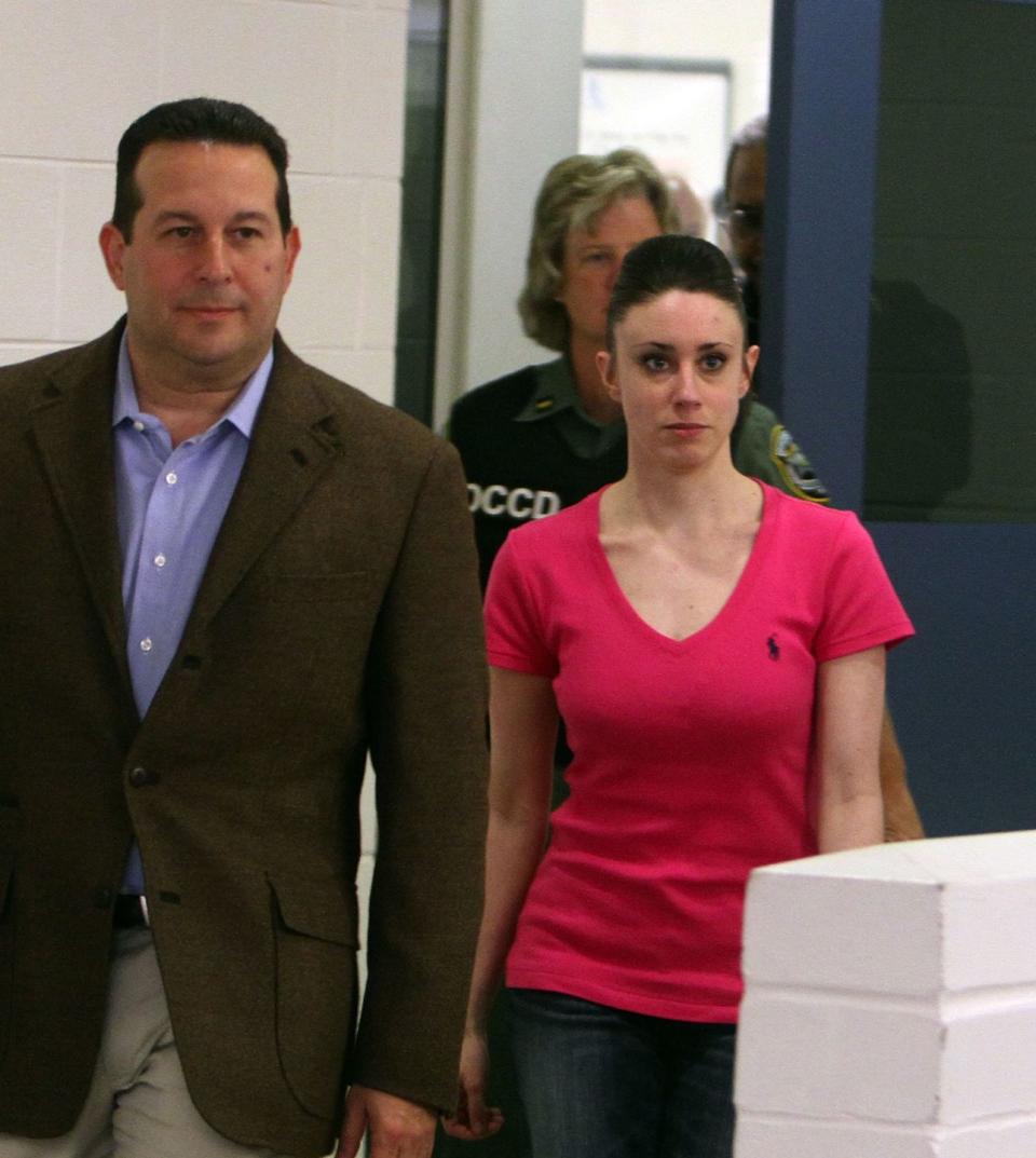 orlando, fl   july 17 casey anthony r leaves with her attorney jose baez from the booking and release center at the orange county jail after she was acquitted of murdering her daughter caylee anthony on july 17, 2011 in orlando, florida it was unknown where casey anthony was going after the release  photo by red huber poolgetty images