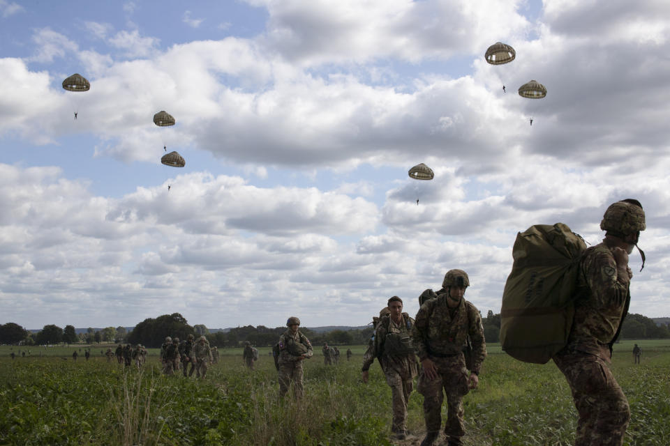 Parachutist jump from a plane near Groesbeek, Netherlands, Thursday, Sept. 19, 2019, as part of commemorations marking the 75th anniversary of Operation Market Garden, an ultimately unsuccessful airborne and land offensive that Allied leaders hoped would bring a swift end to World War II by capturing key Dutch bridges and opening a path to Berlin. (AP Photo/Peter Dejong)