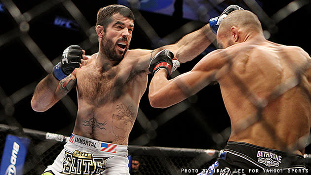 Matt Brown lands a left to Mike Swick's head during their fight at UFC on Fox 5. (Credit: Tracy Lee for Yahoo! Sports)
