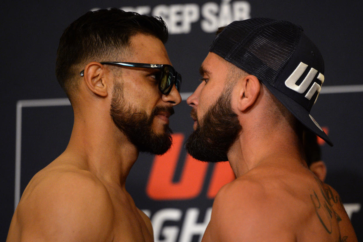 Sep 20, 2019; Mexico City, MEX; Yair Rodriguez (left) and Jeremy Stephens (right) participate in staredowns following weigh ins for UFC Fight Night at JW Marriott. Mandatory Credit: Orlando Ramirez-USA TODAY Sports