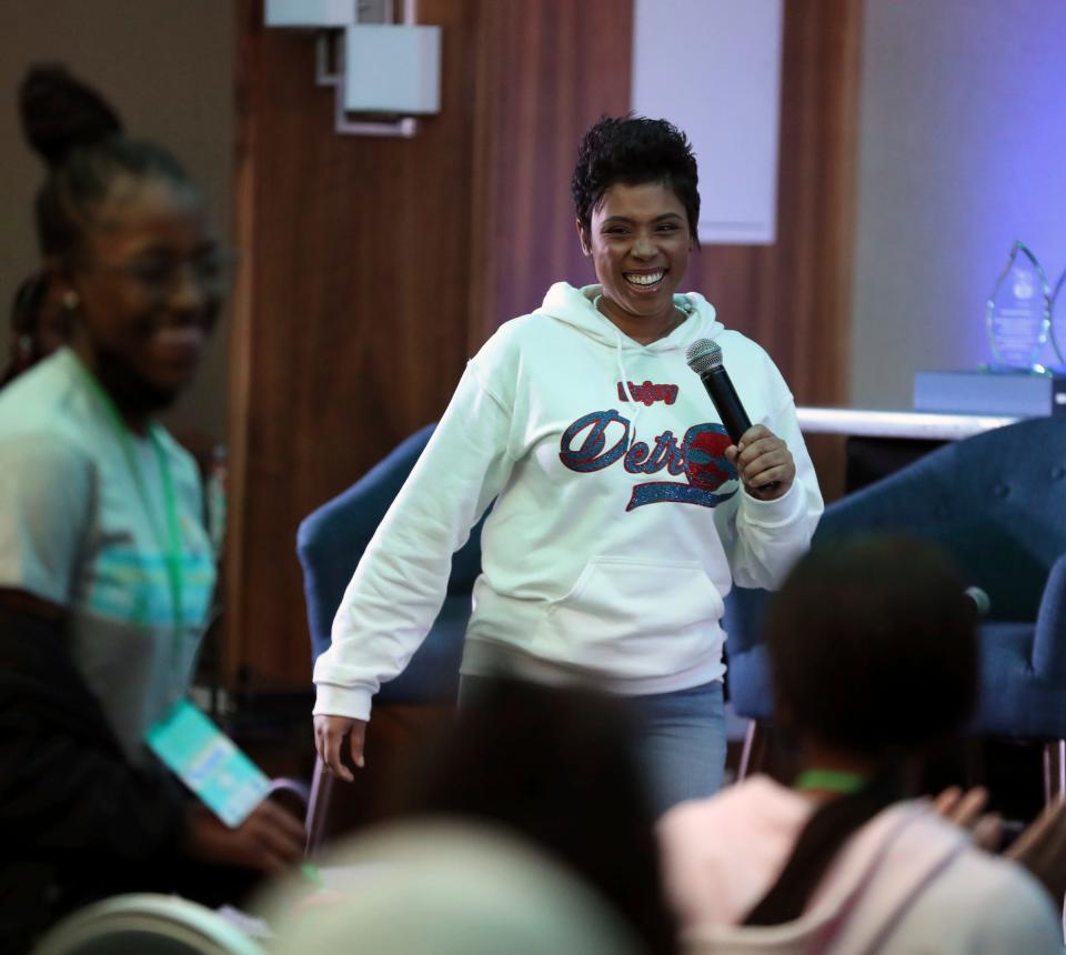 Jasmin Barmore talks to youngsters during the Detroit Public Safety and DPD teen mental health summit Saturday, May 7, 2022, at the Fort Pontchartrain in Detroit.