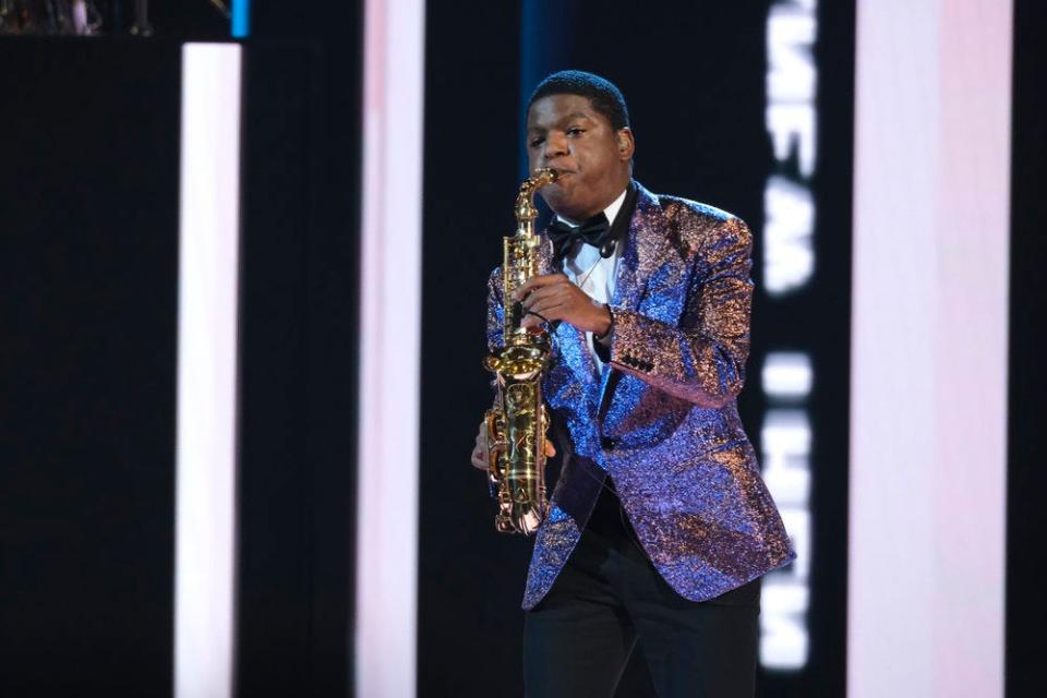 Last up was Avery Dixon, a saxophone player who scored a Golden Buzzer from host Terry Crews during his audition. Dixon's rocking set Tuesday night showed the judges he's a bona fide star — and earned a comparison to "American Idol" winner Carrie Underwood from Simon Cowell.