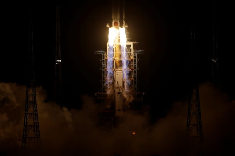 The Long March-5 Y5 rocket, carrying the Chang'e-5 lunar probe, takes off from Wenchang Space Launch Center, in Wenchang