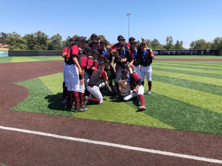 JSerra's baseball team gathers for a photo after winning the Southern California Division I championship game June 26, 2021.