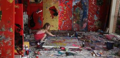 Artist Aelita Andre at work in her studio. (Photo: Screengrab/YouTube)