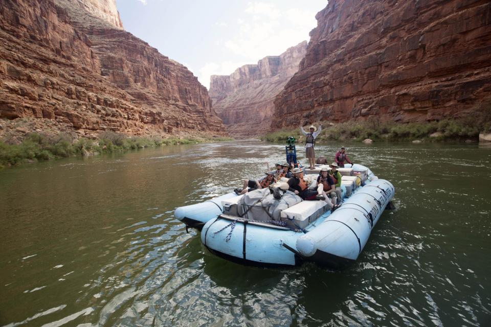 This August, 2013 photo provided by Google shows a frame from a moving time-lapse sequence of images of rafters on the Colorado River in Grand Canyon National Park., Ariz. Google has taken its all-seeing eyes on a trip that few ever get to experience - a moving tour of the river through the Grand Canyon courtesy of a Google time-lapse camera making sequential images. The search giant partnered with American Rivers to showcase the whitewater rapids, a handful of hiking trails, the towering red canyon walls and the stress placed on the river by drought and humans. The imagery taken last August went live Thursday, March 13, 2014. (AP Photo/Google)