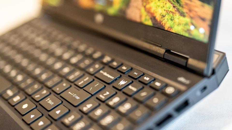 A black Acer Predator Helios Neo 16 gaming laptop on a white table