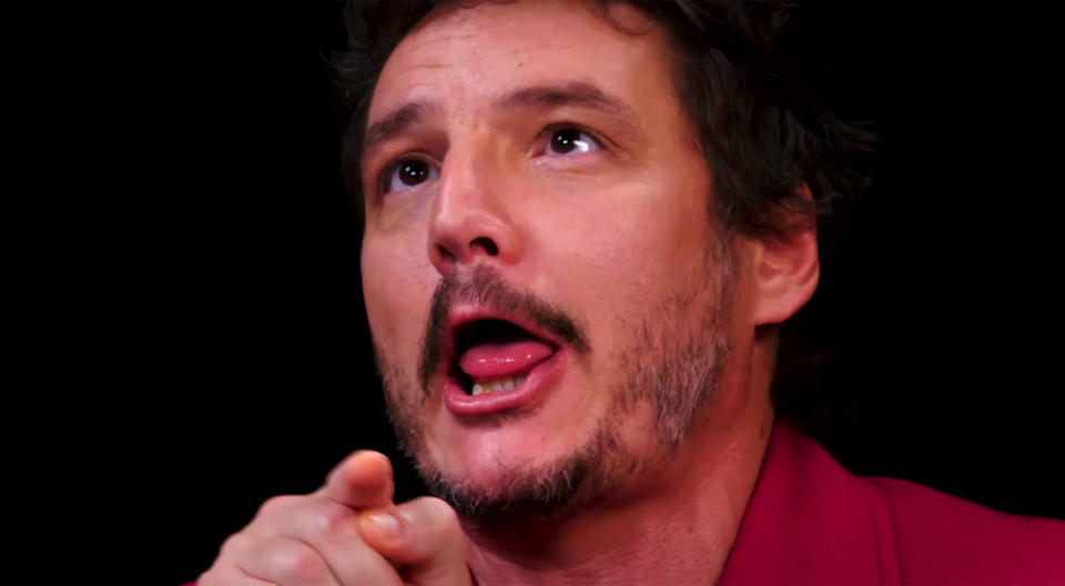 Pedro Pascal trying to subdue the heat of spicy wings. YouTube
 (YouTube)