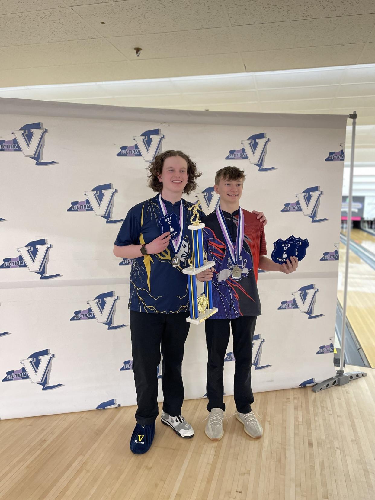 Victor's Toby Prescott, left, and Fairport's Nathan Chaffee eached rolled perfect games to share high-game honors at the Section V Championships on Friday, Feb. 16, 2024 at ABC Gates Bowl.