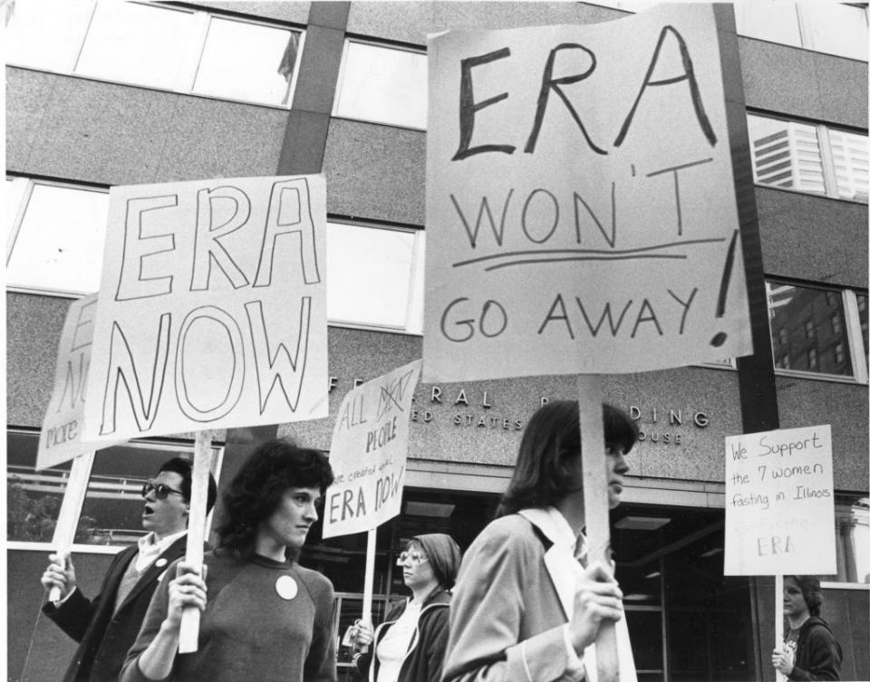 Demonstrators picketed outside the Federal Building in Minneapolis, June 9, 1982, in support of the Equal Rights Amendment and in silent vigil in support of seven fasting ERA supporters in Illinois. | Star Tribune via Getty Images—Star Tribune via Getty Images