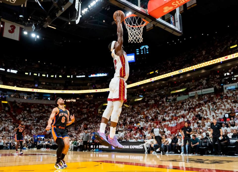 Miami Heat forward Jimmy Butler (22) dunks against the New York Knicks in the first quarter of Game 4 of the NBA Eastern Conference Semifinals at the Kaseya Center in Miami on Monday, May 8, 2023.