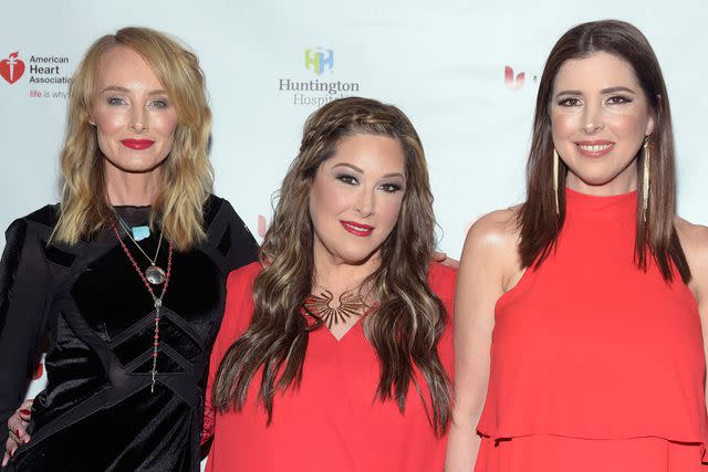 <p>Michael Tullberg/Getty</p> Chynna Phillips, Carnie Wilson and Wendy Wilson of Wilson Phillips attend the 3rd annual Rock The Red Music Benefit on May 17, 2018 in Hollywood, California.
