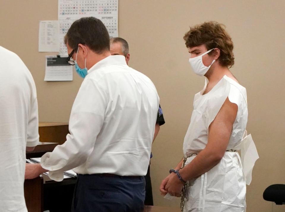 Payton Gendron talks with his attorney during his arraignment in Buffalo City Court, Saturday, May 14, 2022 (AP)