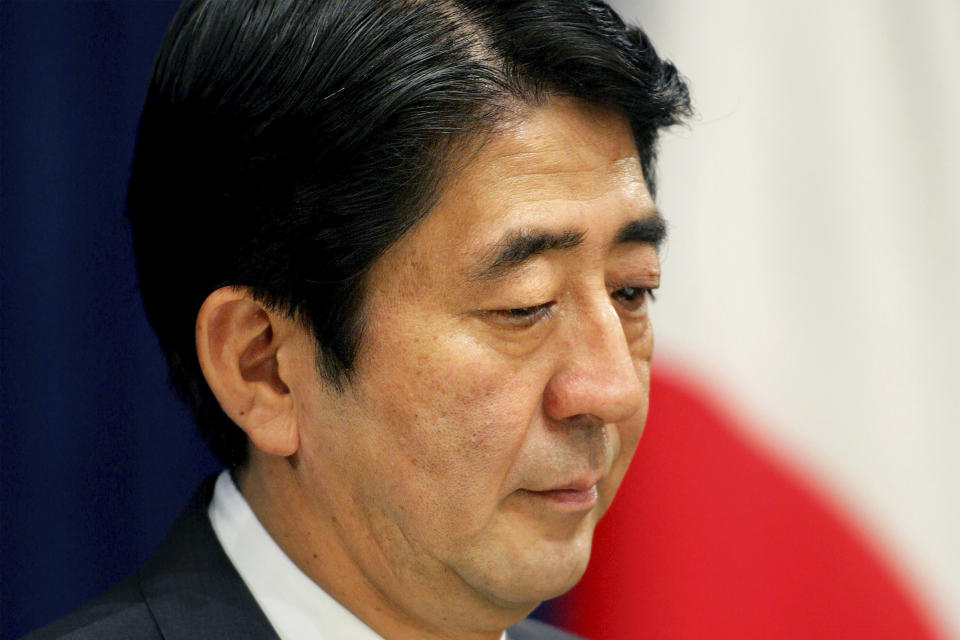 FILE - Japanese Prime Minister Shinzo Abe announces his resignation at a nationally televised press conference in Tokyo on Sept. 12, 2007. In 2007, following electoral defeats that saw the Liberal Democratic Party lose control of the legislature for the first time in 52 years, Abe resigned as prime minister, citing health reasons. (AP Photo/Koji Sasahara, File)