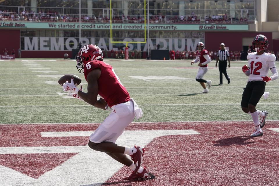 Indiana wide receiver Cam Camper (6) makes a touchdown reception during the second half of an NCAA college football game, against Western Kentucky Saturday, Sept. 17, 2022, in Bloomington, Ind. Indiana won 33-30 in overtime. (AP Photo/Darron Cummings)