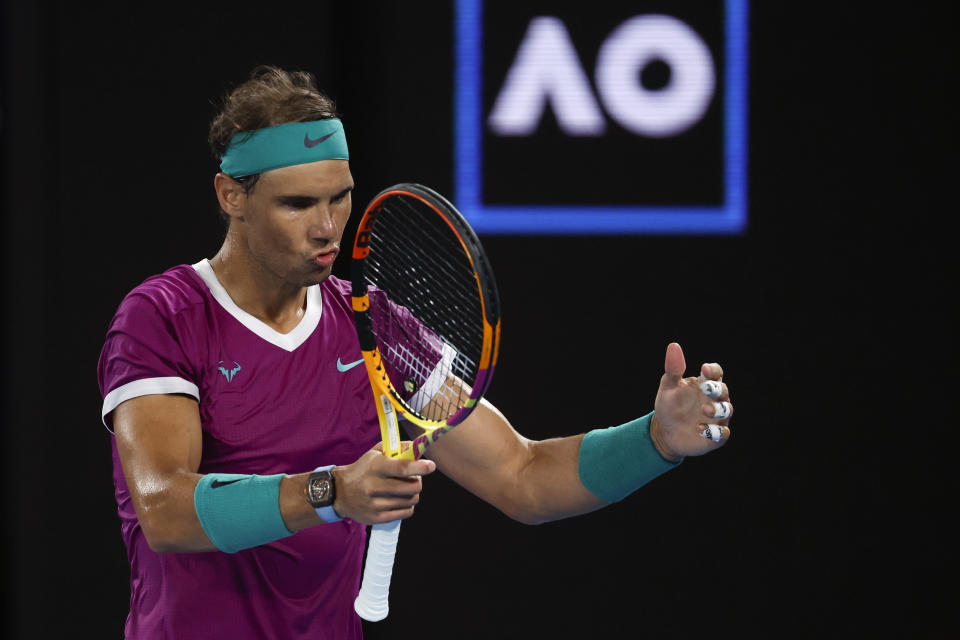 Rafael Nadal of Spain reacts during his semifinal against Matteo Berrettini of Italy at the Australian Open tennis championships in Melbourne, Australia, Friday, Jan. 28, 2022. (AP Photo/Hamish Blair)