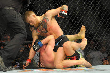 Conor McGregor (top) has upper hand vs. Dennis Siver during UFC Fight Night at TD Garden. (USA TODAY Sports)