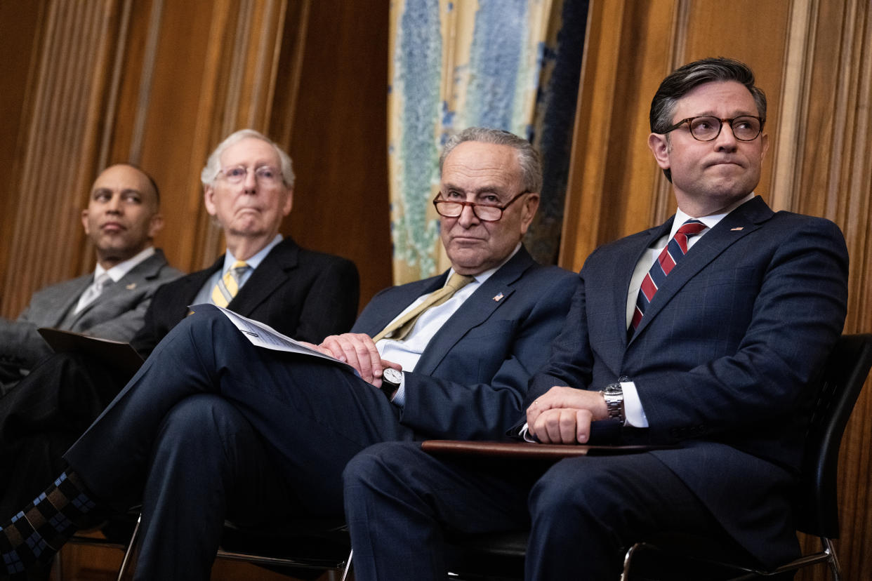 UNITED STATES - DECEMBER 12: From left, House Minority Leader Hakeem Jeffries, D-N.Y., Senate Minority Leader Mitch McConnell, R-Ky., Senate Majority Leader Charles Schumer, D-N.Y., and Speaker of the House Mike Johnson, R-La., attend a Menorah lighting to celebrate the eight-day festival of Hanukkah, in the U.S. Capitol on Tuesday, December 12, 2023. (Tom Williams/CQ-Roll Call, Inc via Getty Images)