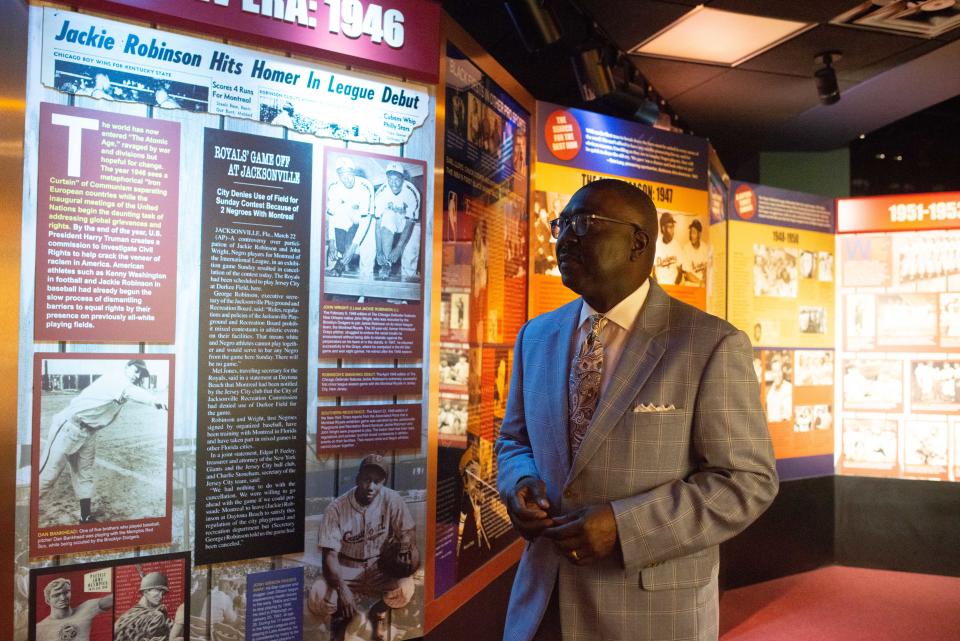 Bob Kendrick, president of the Negro Leagues Baseball Museum in Kansas City, walks through a portion of the museum showcasing eras in baseball that feature prominent Black players on Oct. 5, 2021.