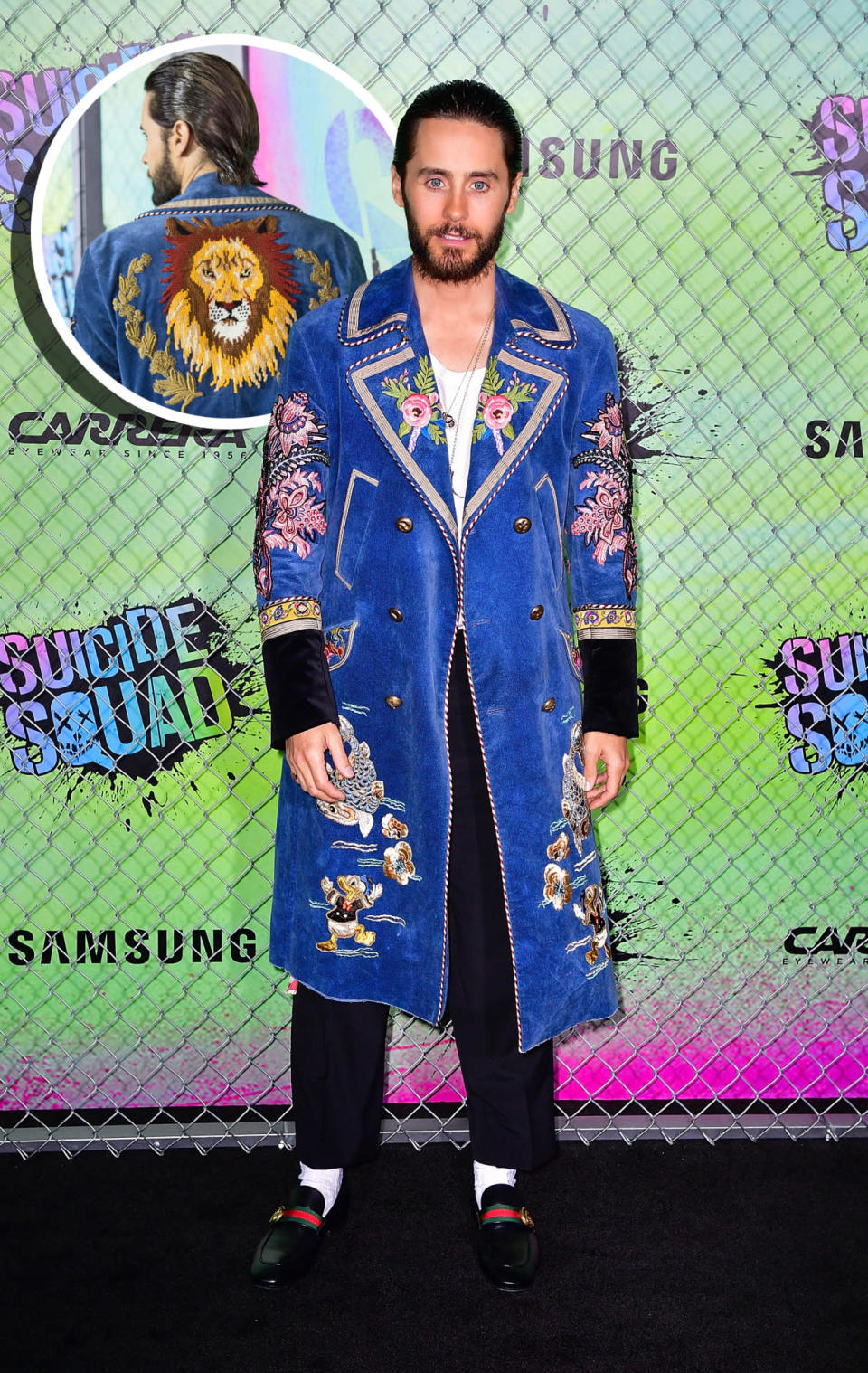 <p>Jared Leto, who plays The Joker in <i>Suicide Squad </i>and took his method acting very seriously throughout filming, played the part of Gucci ambassador very well at the premiere wearing an ensemble straight off the runway. The singer paired a blue suede coat with flower, Donald Duck, and lion patches on it with loafers and cropped trousers. <i>(Photo: Getty Images)</i></p>