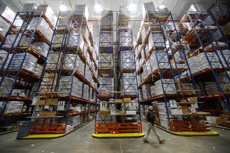 Imported frozen seafood, some from China, is shown housed in a large refrigerated warehouse at Pacific American Fish Company imports (PAFCO) in Vernon, California