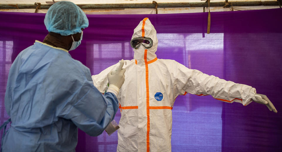 Medical staff members in PPE.