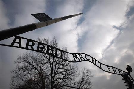 A view of the sign "Arbeit macht frei" at the main gate to the Auschwitz concentration camp