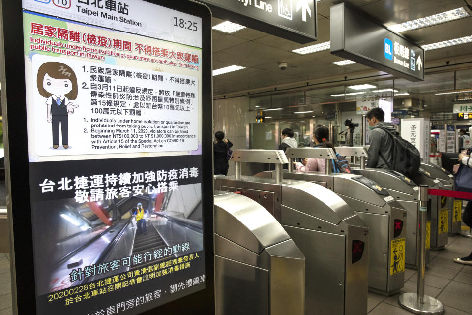 FILE PHOTO : Taipei metro signs warning about the Coronavirus in the MRT station on March 19, 2020 in Taipei, Taiwan. (Photo by Paula Bronstein/Getty Images )