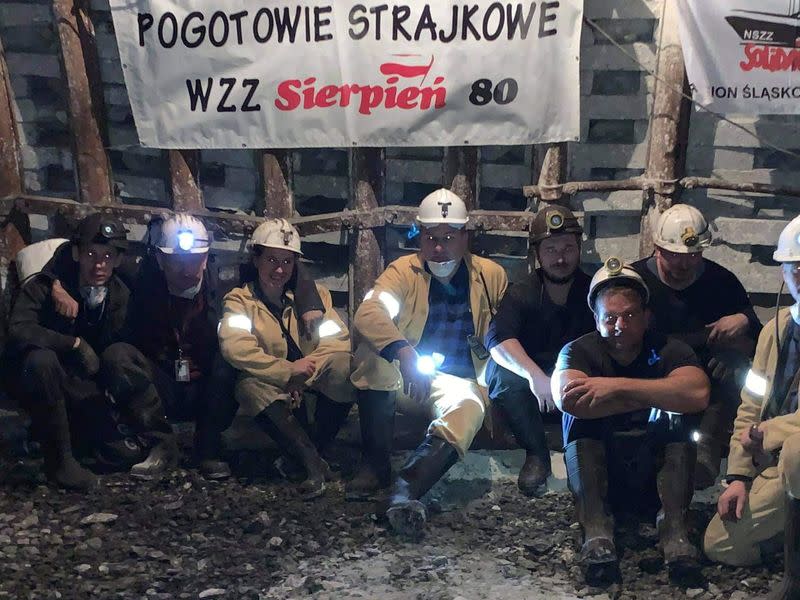 Miners are pictured during their underground protest in Myslowice-Wesola mine in Myslowiece