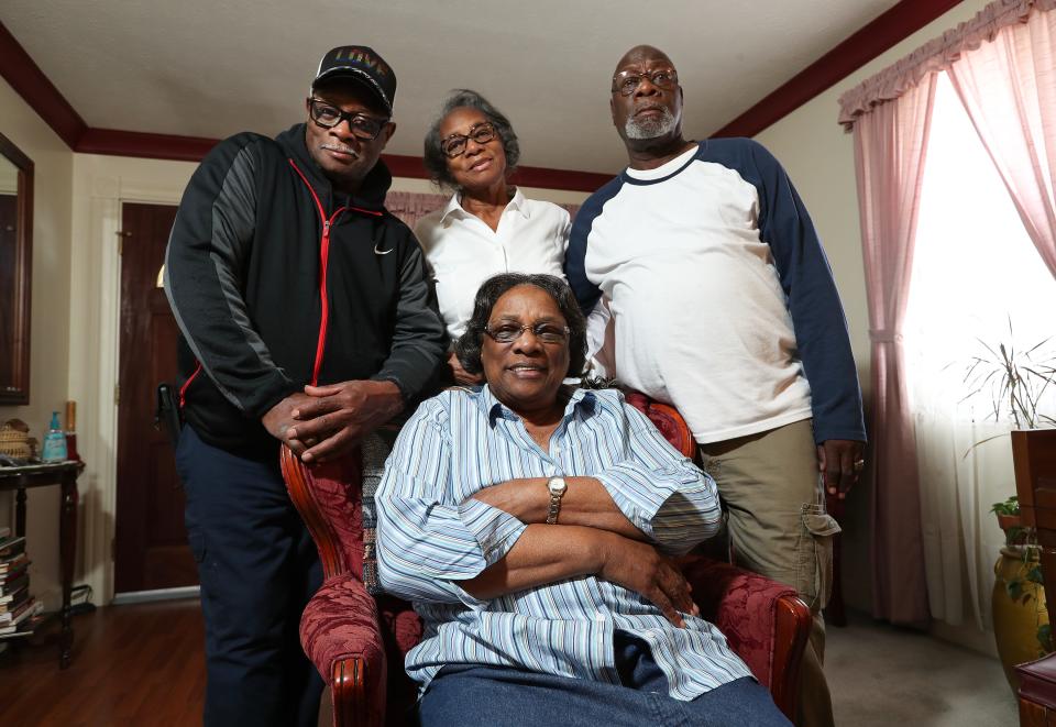 Ruth Johnson-Watts, 81, sitting, along with David Johnson, 72, left, Gladys Johnson Dorsey, 73, and Louis Johnson, 75, right, are four of seven living siblings who are descendants of Oliver Lewis, the first jockey to win the Kentucky Derby, aboard Aristides in 1875. They were at the home of Johnson-Watts in Cincinnati on March 20, 2024.