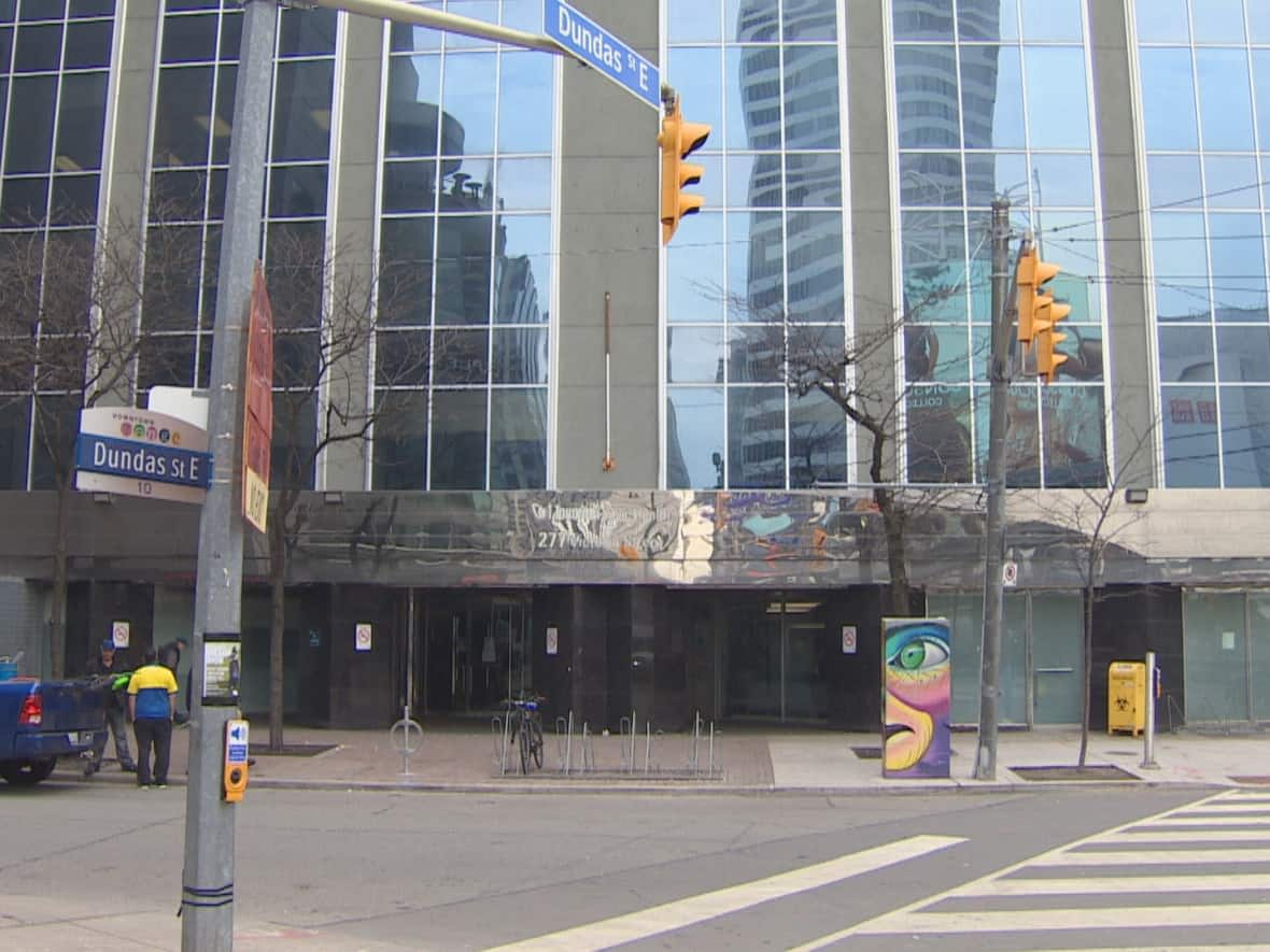 Toronto Metropolitan University is buying the building at 277 Victoria St., which houses The Works, a supervised injection site, and the main office of Toronto Public Health, where 800 employees work. The sale means The Works will have to be relocated. (CBC - image credit)