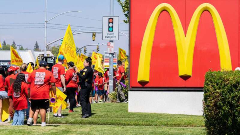 Fast food workers protest outside a McDonald's in California.