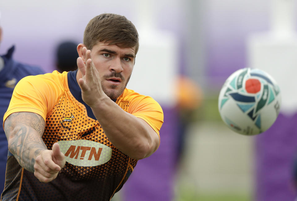 South Africa's Malcolm Marx passes the ball during a training session in Tokyo, Japan, Thursday, Oct. 17, 2019. South Africa play Japan in a Rugby World Cup quarterfinal on Sunday Oct. 20. (AP Photo/Mark Baker)