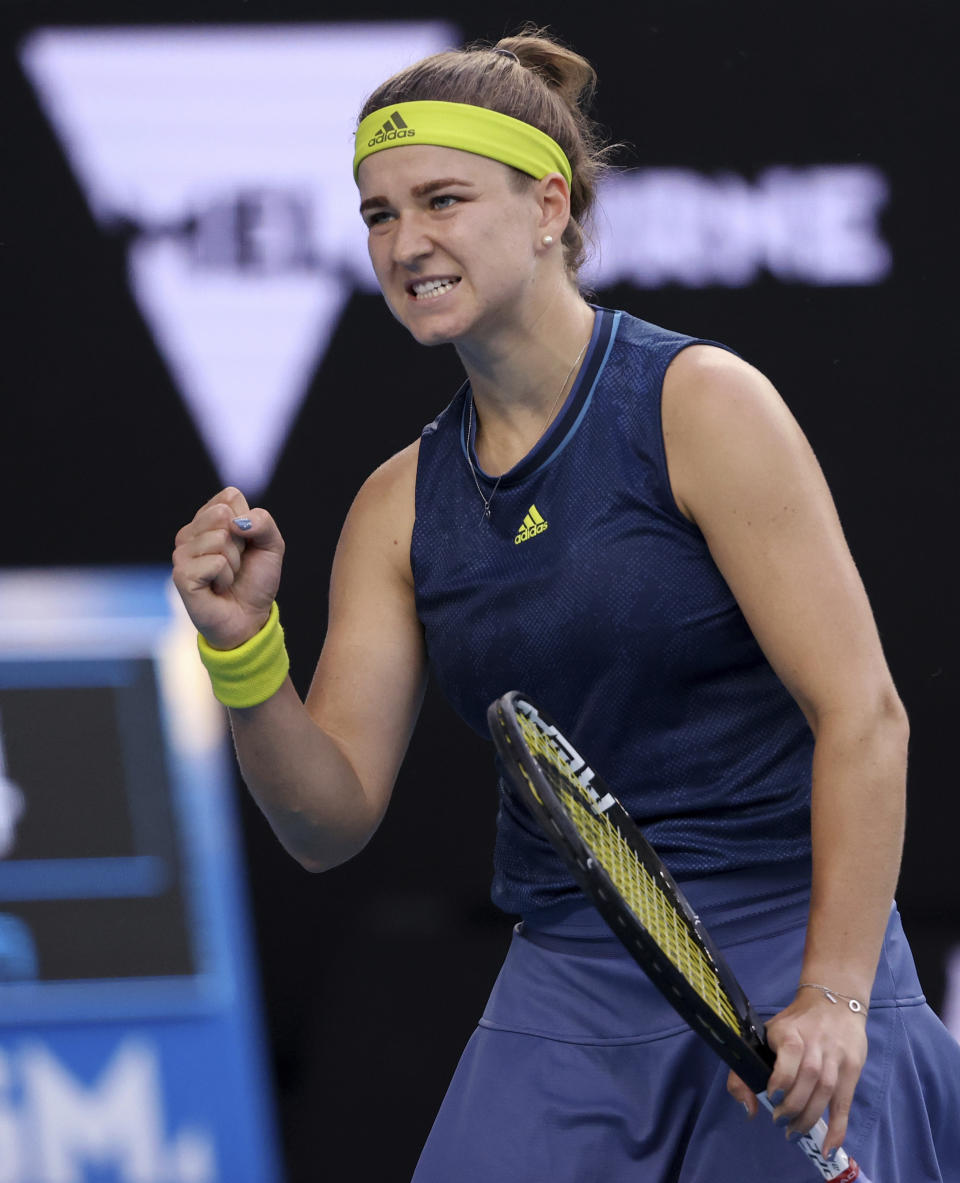 Czech Republic's Karolina Muchova celebrates winning a point against Belgium's Elise Mertens during their fourth round match at the Australian Open tennis championships in Melbourne, Australia, Monday, Feb. 15, 2021. (AP Photo/Hamish Blair)