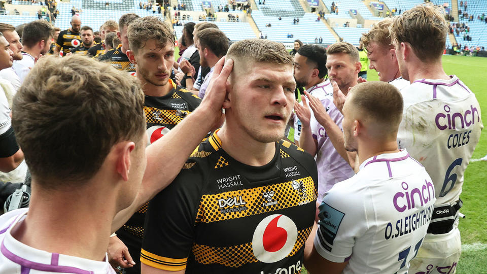 Pictured centre, Wasps star Jack Willis walks off the field after his side's Premiership defeat to Northampton. 