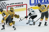 San Jose Sharks right wing Kevin Labanc (62) scores on Vegas Golden Knights goaltender Marc-Andre Fleury (29) during the second period of an NHL hockey game Wednesday, March 17, 2021, in Las Vegas. (AP Photo/John Locher)