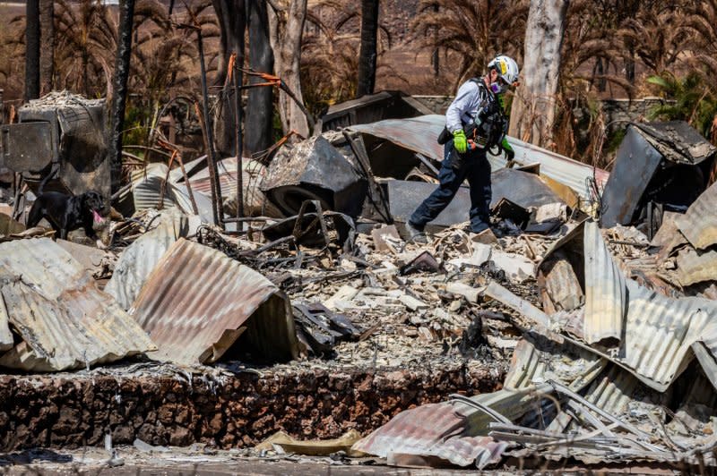 Members of Combined Joint Task Force 50 (CJTF-50) search, rescue and recovery conduct search operations of areas damaged by wildfires in Lahaina, Maui, on August 15. File Photo by Staff Sgt. Matthew A. Foster/U.S. Army National Guard/UPI