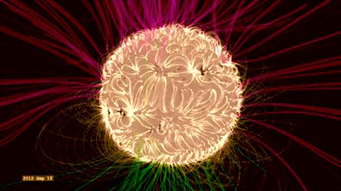 A rendering shows how magnetic lines on the sun can evolve over time. These are shown in yellow pink and blue.