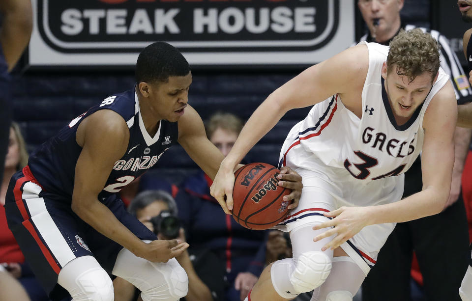 Gonzaga guard Zach Norvell Jr., left, strips the ball from Saint Mary’s center Jock Landale during the first half of an NCAA college basketball game Saturday, Feb. 10, 2018, in Moraga, Calif. (AP Photo/Marcio Jose Sanchez)
