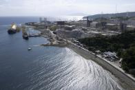 The Ilijan liquified natural gas plant is visible along the coast of Ilijan, Batangas province, Philippines on Friday, Aug. 11, 2023. The Philippines is seeing one of the world's biggest buildouts of natural gas infrastructure. (AP Photo/Aaron Favila)