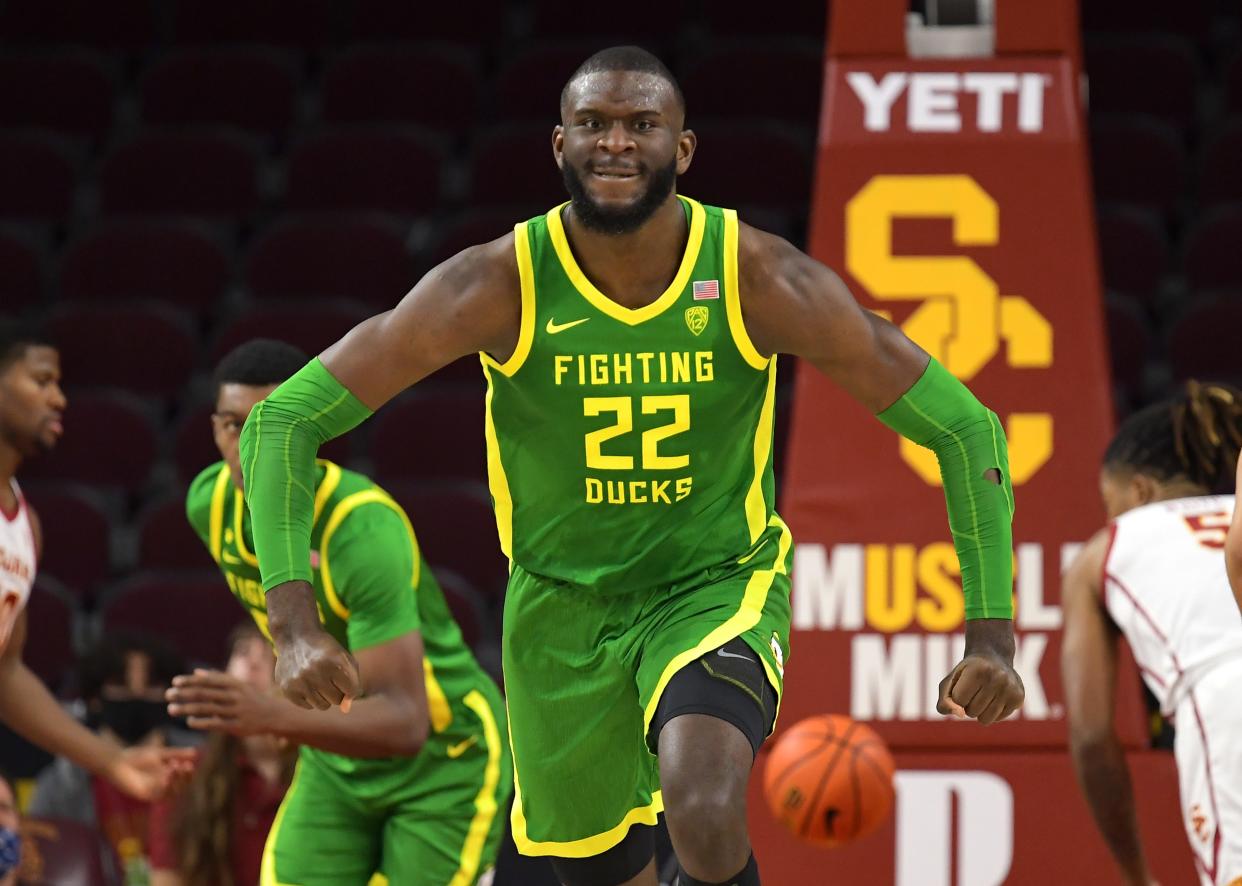 Oregon center Franck Kepnang reacts as he heads down court after a basket in the first half against the USC. Mandatory Credit: Jayne Kamin-Oncea-USA TODAY Sports