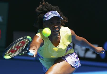 Tennis - Australian Open - Melbourne Park, Melbourne, Australia - 18/1/17 Venus Williams of the U.S. hits a shot during her Women's singles second round match against Switzerland's Stefanie Voegele. REUTERS/Thomas Peter