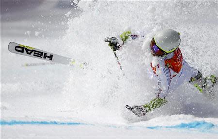 Andorra's Joan Verdu Sanchez crashes during the first run of the men's alpine skiing giant slalom event at the 2014 Sochi Winter Olympics at the Rosa Khutor Alpine Center February 19, 2014. REUTERS/Dominic Ebenbichler